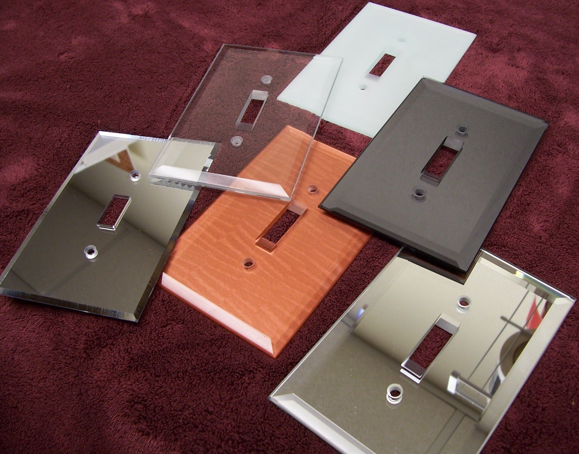 Mirrored glass switch plates in many styles and colors