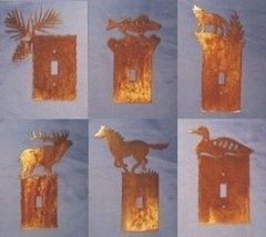 unique light switch cover Collage of copper patina switch plate options in six varieties, five with animals, and one with a bit of evergreen branch.